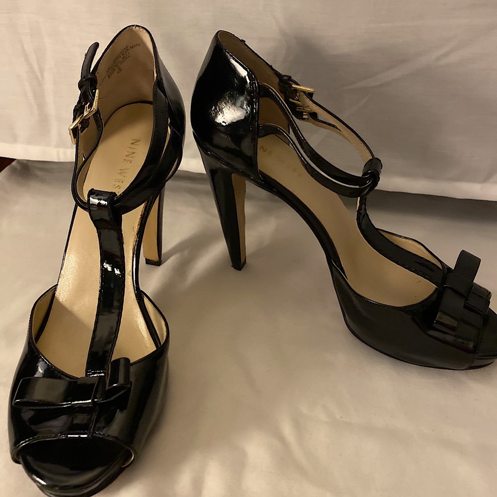 Black patent leather peep toe heels